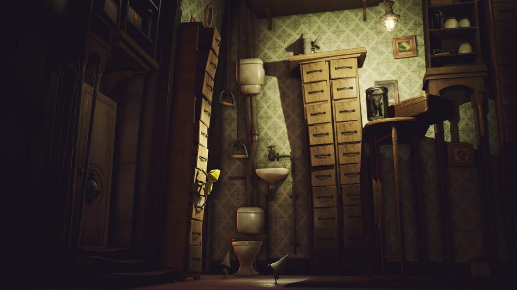 A dark and atmospheric screenshot from Little Nightmares showing the protagonist, Six, a small child in a yellow raincoat, sneaking through a dimly lit, industrial environment.