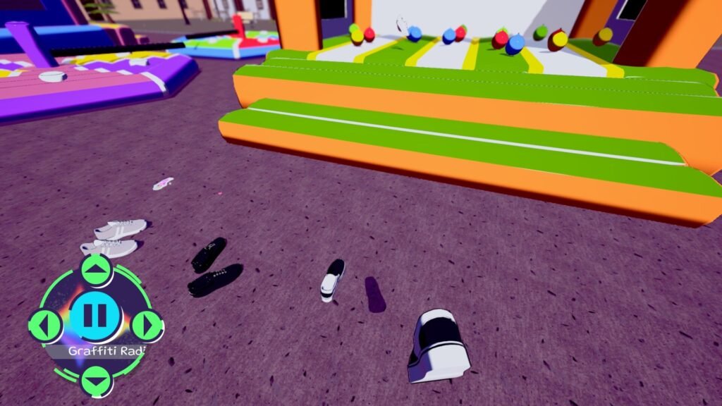 A pair of shoes abandoned near a colorful inflatable obstacle course in Bambas!