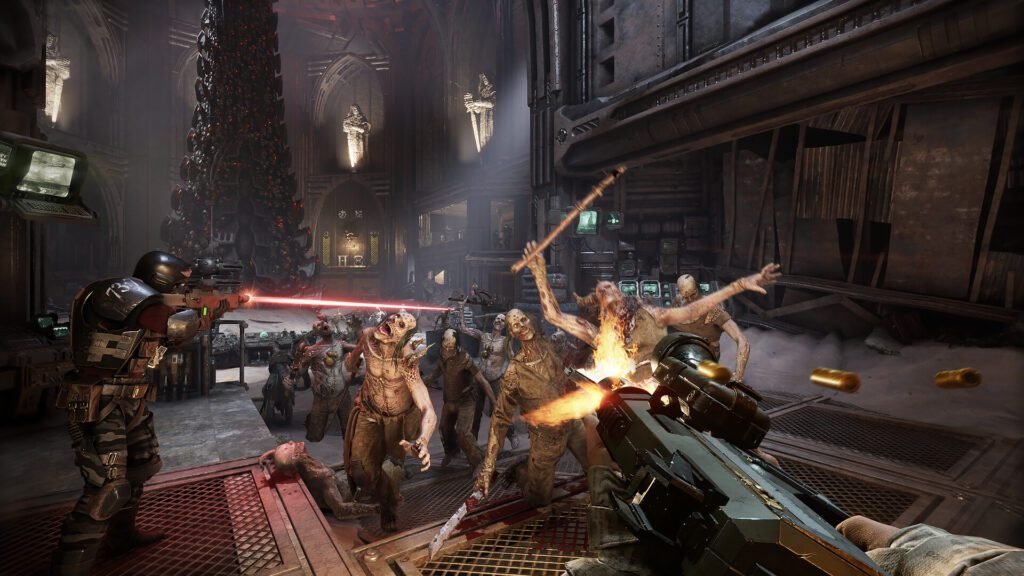 Darktide players firing at swarm of zombie-like enemies inside gothic cathedral